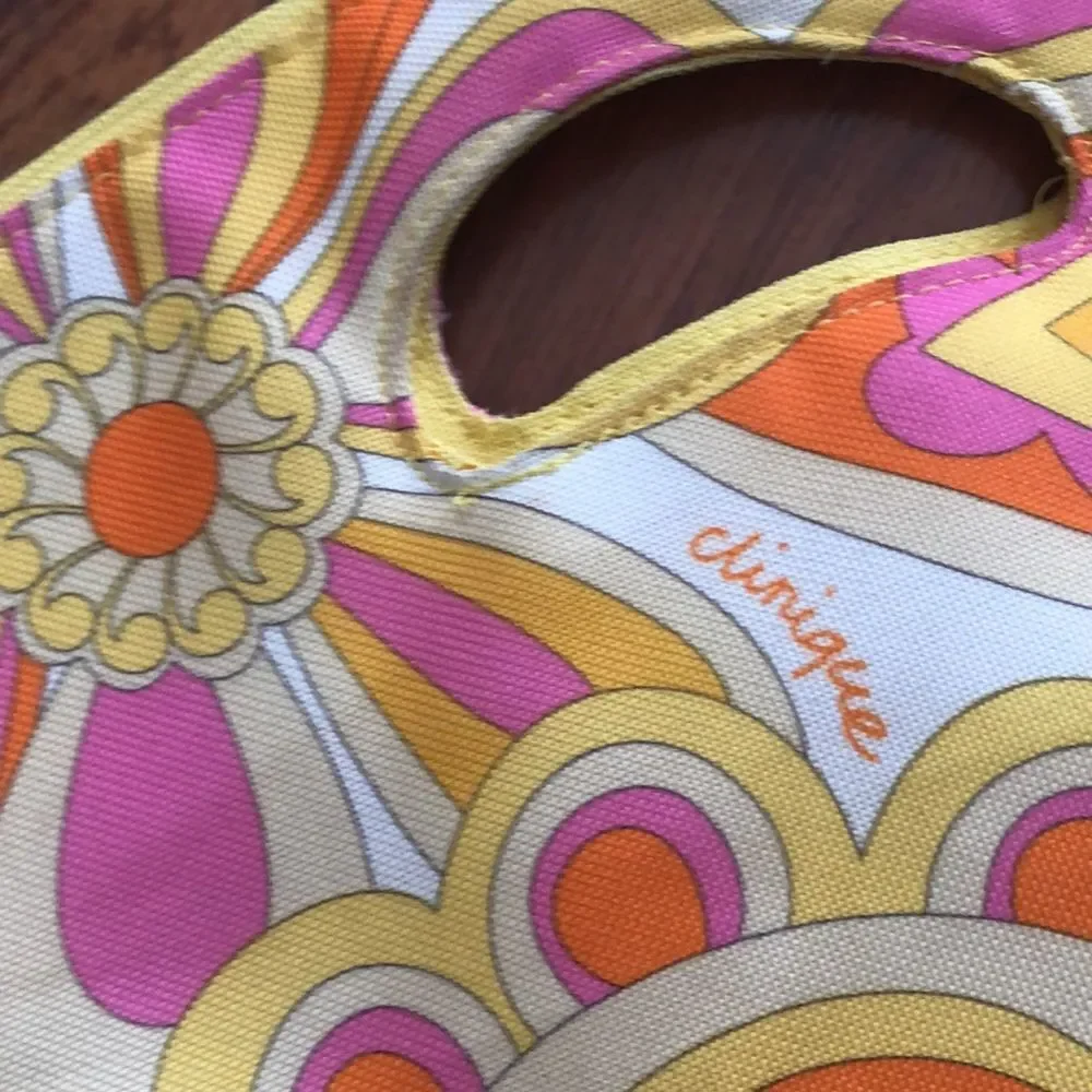 Large Clinique printed retro print style Handbag.